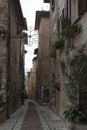 Spectacular traditional italian medieval alley in the historic center of beautiful little town of Spello Perugia Royalty Free Stock Photo