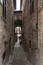 Spectacular traditional italian medieval alley in the historic center of beautiful little town of Spello Royalty Free Stock Photo