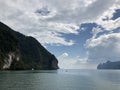 Spectacular, unique view from the sea to the hanging cliffs of Thailand Islands on a clear day