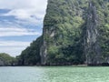 Spectacular, unique view from the sea to the hanging cliffs of Thailand Islands on a clear day