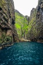 Spectacular Vestmanna cliffs and waterfall in Faroe Islands Royalty Free Stock Photo