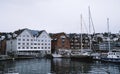 Spectacular view of boats and houses in the port of Tromso in winter, Norway. Royalty Free Stock Photo