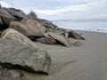 A spectacular view of large rocks blocking the waves at Banda Aceh beach in Indonesia Royalty Free Stock Photo