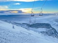 Spectacular view of the morning sky and ungroomed slopes of a closed ski resort. Royalty Free Stock Photo