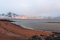 spectacular view of snow-covered mountains fjord and rainbow