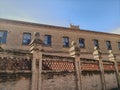 Spectacular view of sunlight on stone of a monastery and detail of windows