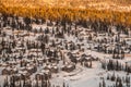 Spectacular view from top of the mountain. Forest and wooden houses.