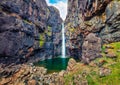 Spectacular waterfall in the outskirts of Haldarsvik village. Gorgeous summer scene of Streymoy island, Faroe, Kingdom of Denmark,