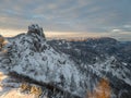 Spectacular winter mountain landscape illuminated by setting sun.