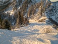 Spectacular winter mountain landscape illuminated by setting sun.