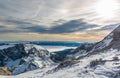 Spectacular winter mountain panorama with peaks covered with early snow.