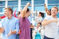 Spectators Cheering At Outdoor Sports Event Royalty Free Stock Photo