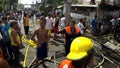 Spectators and curious bystanders on house fire site