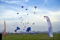 Spectators enjoy the large kites flying at Mina district in Qatar as part of Kite Festival 2024 Royalty Free Stock Photo