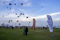 Spectators enjoy the large kites flying at Mina district in Qatar as part of Kite Festival 2024 Royalty Free Stock Photo