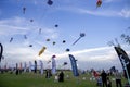 Spectators enjoy the large kites flying at Mina district in Qatar as part of Kite Festival 2024 Royalty Free Stock Photo