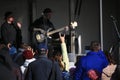 Spectators in front of stage at performance of the St. Petersburg band The Sounds of Silence on open air, close up