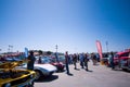 Spectators at Goodguys car show saying the Pledgeof allegiance to the flag