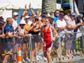 Spectators line street waiting for athletes in Port Of Tauranga Half Marathon