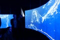 Spectators looking the work by Hito Steyerl titled LeonardoÃ¢â¬â¢s submarine exposed at the Central Pavilion during the 58th