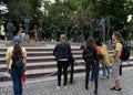 Spectators at the sculptural composition of Mikhail Shemyakin `Children - victims of adult vices` in Moscow Royalty Free Stock Photo