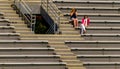 Spectators Sitting In the Bleachers