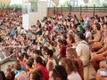 Spectators on tribune watching the show