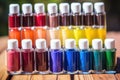 a spectrum of colorful nail paints in their bottles Royalty Free Stock Photo