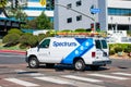 Spectrum Phone, Cable TV, and Internet telecommunications service van is driving to performing a service call