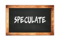 SPECULATE text written on wooden frame school blackboard