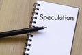 Speculation write on notebook Royalty Free Stock Photo