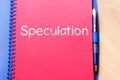 Speculation write on notebook Royalty Free Stock Photo