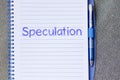Speculation write on notebook Royalty Free Stock Photo