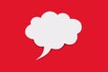 Speech bubble in the form of a cloud on a red background Royalty Free Stock Photo