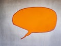Speech bubble on grey concrete wall Royalty Free Stock Photo