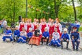 Speech by the folk choir and children-spoonboys at the press festival in Gagarin`s Park on a spring sunny day