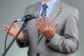 Speech with microphone and hand gesture Royalty Free Stock Photo