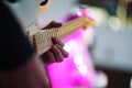 Speech by musicians on stage. Hands and musical instrument closeup.