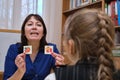 Speech therapist holds a lesson with young children
