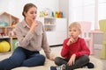 Speech therapist working with boy in office Royalty Free Stock Photo
