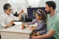 speech therapist working with child who has hearing problems Royalty Free Stock Photo