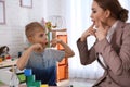 Speech therapist working with little boy Royalty Free Stock Photo