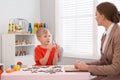 Speech therapist working with little boy Royalty Free Stock Photo