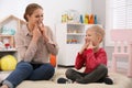 Speech therapist working with little boy Royalty Free Stock Photo