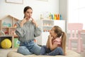 Speech therapist working with little girl Royalty Free Stock Photo