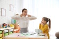Speech therapist working with little girl Royalty Free Stock Photo
