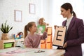 Speech therapist working with little girl Royalty Free Stock Photo