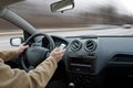 Driver using cell phone in car blurred motion Royalty Free Stock Photo