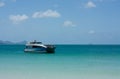A speed boat anchored at the Whitehaven Beach in Whitsundays Royalty Free Stock Photo