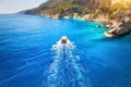 Speed boat in blue sea at sunrise in summer. Aerial view Royalty Free Stock Photo